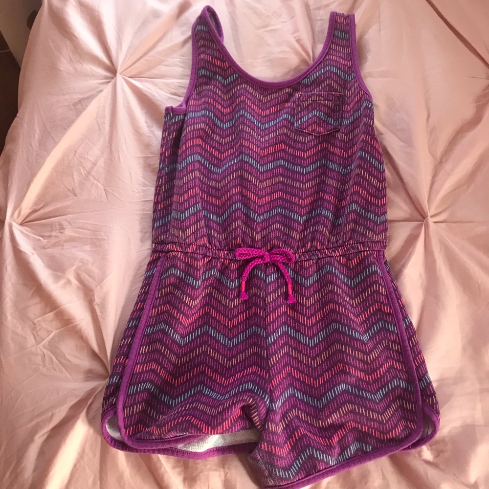 Purple and neon striped romper.